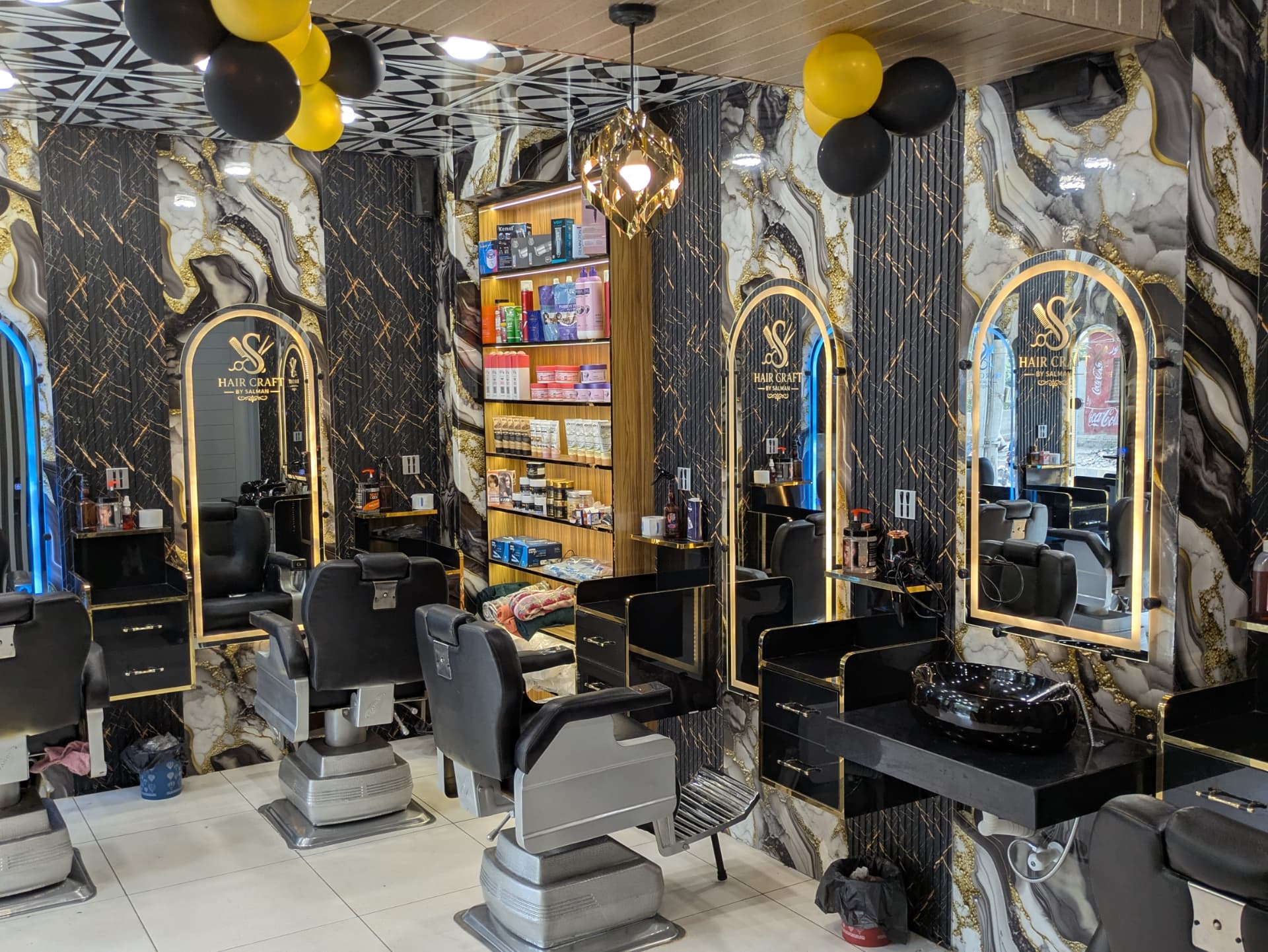 Gold-trimmed marble interior with product shelf